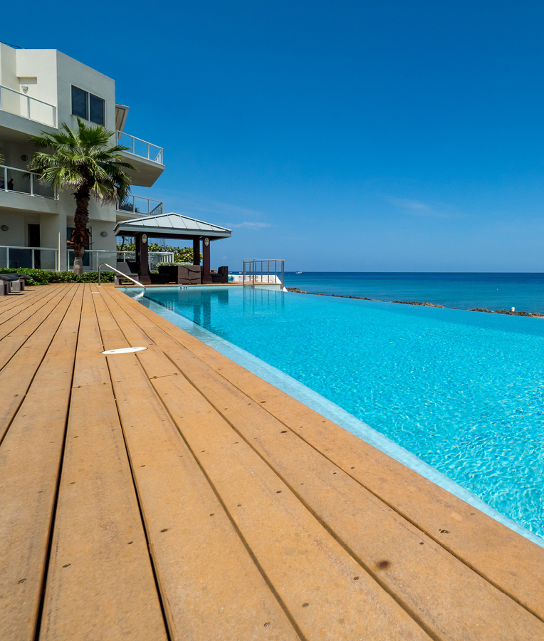 Long pool overlooking the ocean in the Cayman islands.