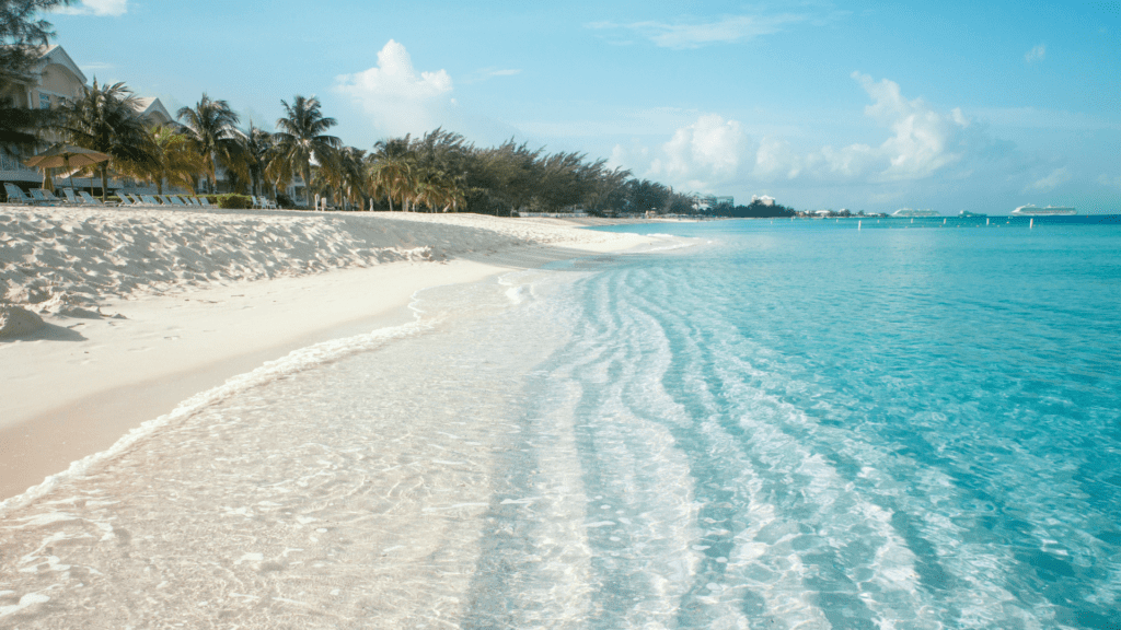 clear ocean water, white sandy beaches and Luxury Homes Cayman Islands